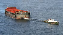 Unknown tug with tow